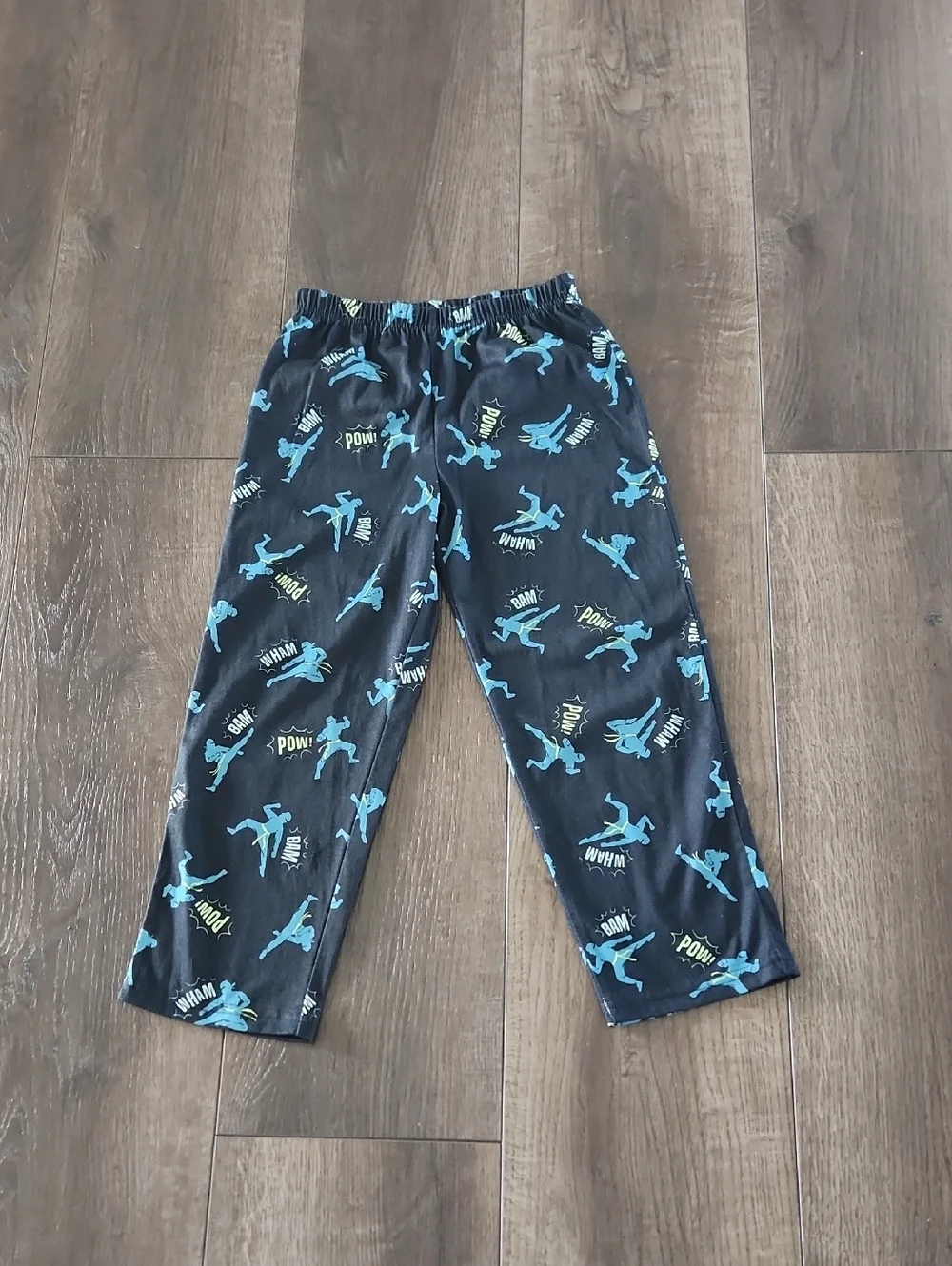 Carter's Black Pajama Bottoms with Blue and Yellow Action Motifs